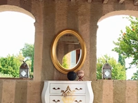 Specchio ovale Azimut con cornice in legno finitura Oro di Tonin Casa