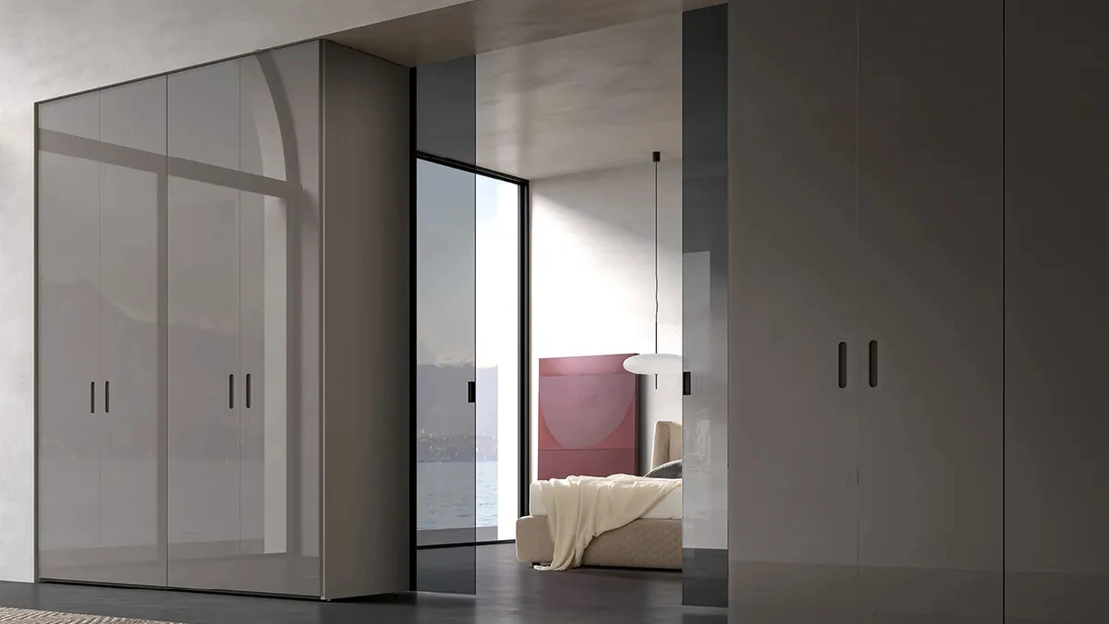 Armadio Atelier bifacciale con anta Fit realizzata in vetro laccato con finitura Fango e porta in vetro scorrevole di Adok