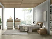 Letto in materico noce ambra con testiera Narciso di Tomasella