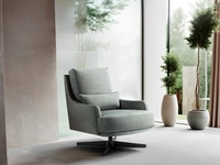 Poltrona in tessuto con base girevole in metallo Filicudi di Franco Ferri