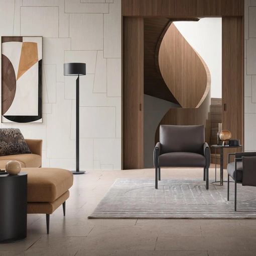 Poltroncina Andy in ecopelle con struttura in metallo di Le Comfort