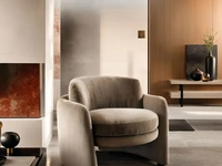 Poltrona in tessuto Ringo di Franco Ferri