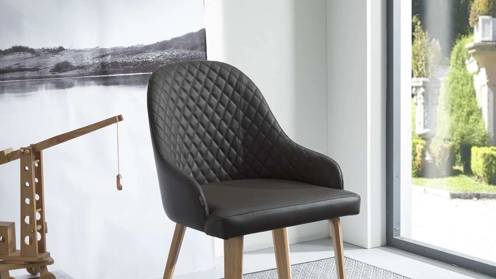 Sedia girevole Atena di Ozzio