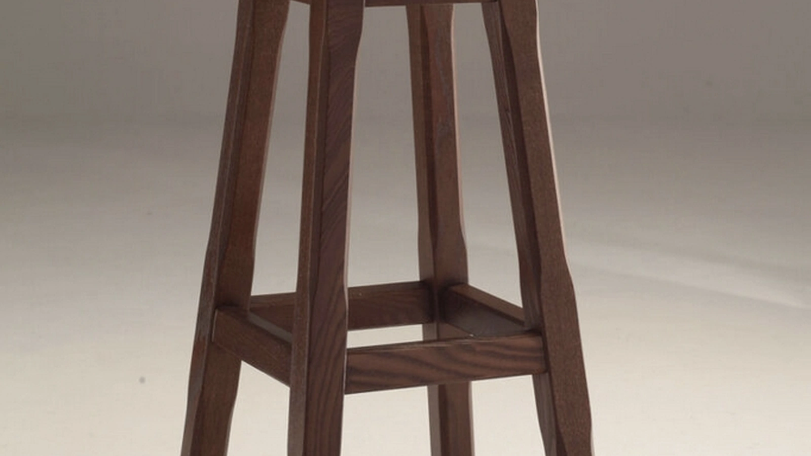 Sgabello Giotto SG con seduta in ecopelle e base in legno di Sedie Brianza