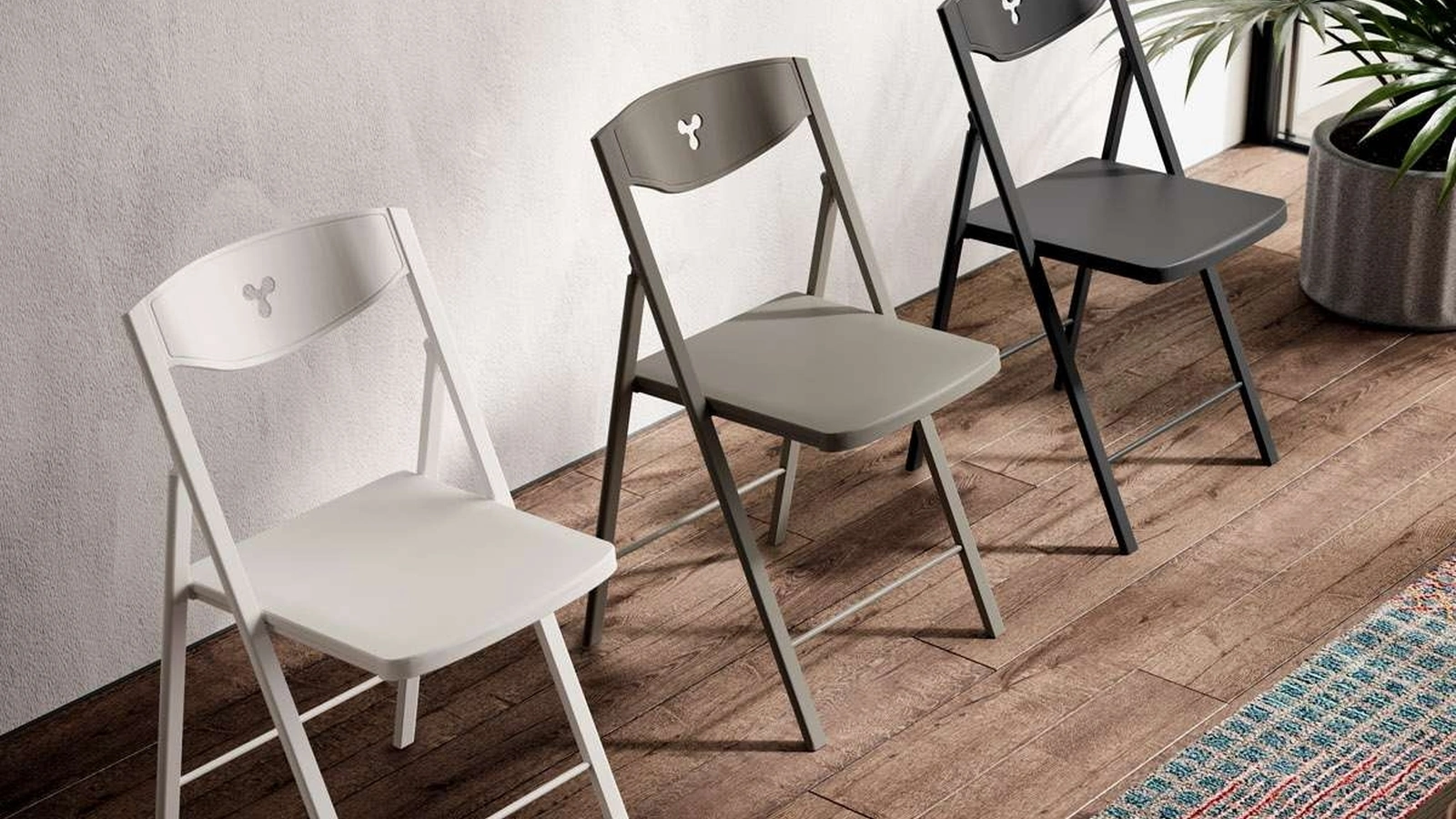 Sedia pieghevole Plio in polipropilene con struttura in metallo di Ozzio