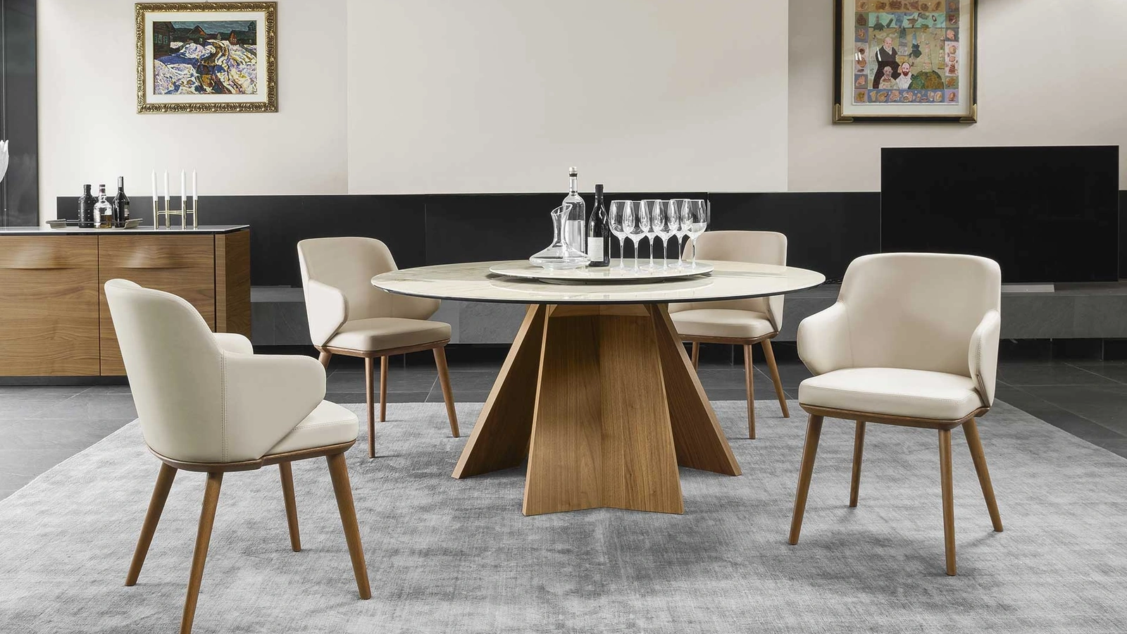 Tavolo rotondo con piano in ceramica e basamento in legno Icaro di Calligaris