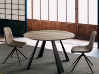 Tavolo rotondo allungabile Saturn-INO in nobilitato rovere nodato con struttura in metallo verniciato nero di La Seggiola