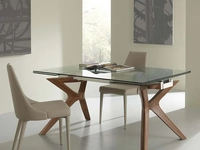 Tavolo allungabile Palladio in vetro temperato con gambe in massello tinto noce americano di La Seggiola