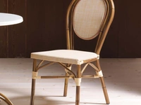 Sedia Jakarta in tessuto e alluminio ricoperto in PVC effetto bambù di La Seggiola