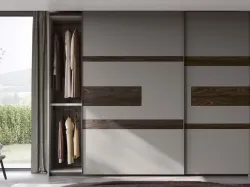 Armadio con ante scorrevoli e porta TV Emotion di Fimar