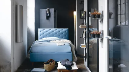 Letto in ecopelle con testiera capitonnè e contenitore So Ever di Noctis