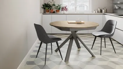 Tavolo rotondo allungabile Twist con top in laminato e gambe in metallo verniciato di Arredo3