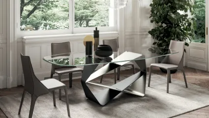 Tavolo scultura con piano in cristallo e base in metallo Gem di Ozzio